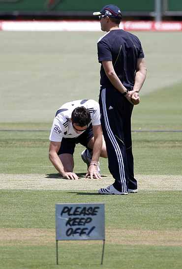 England's James Anderson checks the pitch ahead of the third Ashes Test in Perth
