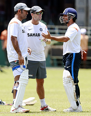 Sachin Tendulkar with MS Dhoni (left) and coach Gary Kirsten (centre)