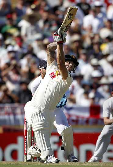 Australia's Mitchell Johnsonn hits a six during the third Ashes Test against England in Perth