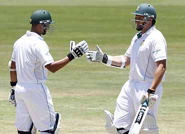 South Africa's Alviro Petersen and Graeme Smith shak hands during the first Test against India at Centurion