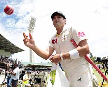 Australia's Ryan Harris reacts after winning the third Ashes Test against England at Perth