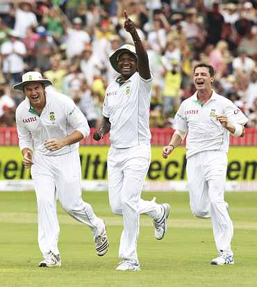 South Africa's Lonwabo Tsotsobe celebrates after taking a catch during the second Test match in Durban