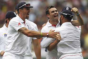 England's James Anderson celebrates after picking up a wicket during the fourth Ashes Test against Australia in Melbourne