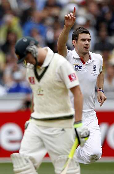 England's James Anderson celebrates after picking up Steven Smith during the fourth Ashes Test against Australia in Melbourne