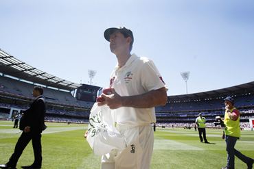 A dejected Ponting walks off the MCG after the humiliating defeat