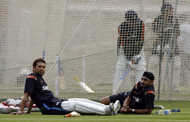 Tendulkar and Harbhajan Singh take a break in the nets