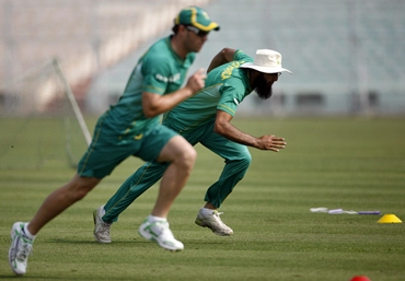 Hashim Amla and teammate de Villiers