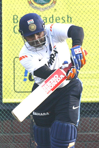 Virender Sehwag bats in the nets during a practice session in Dhaka