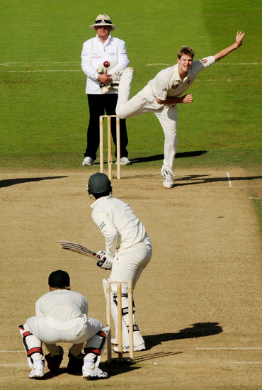 Australia's Steven Smith bowls to Pakistan's Salman Butt during the first Test match at Lord's