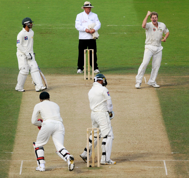 Steve Smith celebrates after picking Imran Farhat's wicket
