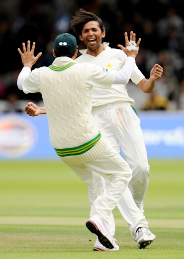 Mohammad Asif celebrates after picking up a wicket