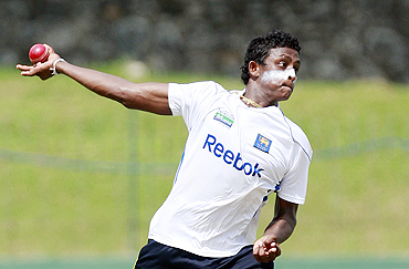 Sri Lanka's Ajantha Mendis bowls in the nets during a practice session in Colombo on Sunday