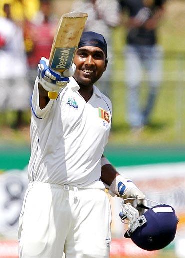 Mahela Jayawardene celebrates after scoring a century