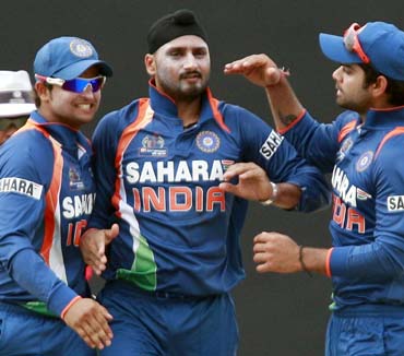 Harbhajan Singh is jubilant after taking the wicket of Bangladesh's captain Shakib Al Hasan