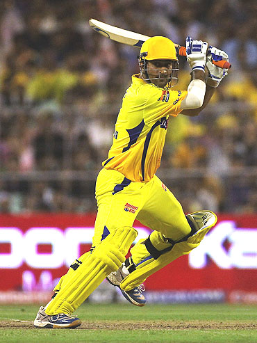Mahendra Singh Dhoni cuts one to the boundary