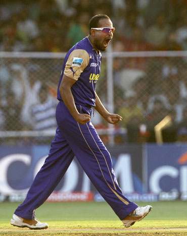 Yusuf Pathan celebrates after picking up Manoj Tiwari