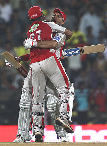 Yuvraj Singh and Irfan Pathan embrace after defeating Chennai Super Kings