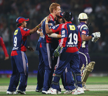 Andrew McDonald of the Daredevils celebrates with his team after taking the wicket of Manoj Tiwary