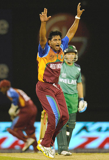 West Indies' Ravi Rampaul (left) reacts after dismissing Ireland's Niall O'Brien (right)