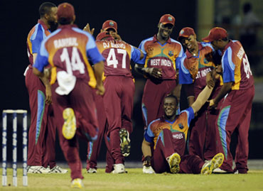West Indies players celebrate after winning a match