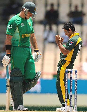 South Africa's Graeme Smith leaves the field after being dismissed by Pakistan's Abdur Rehman