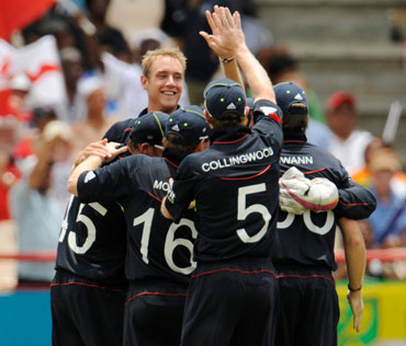 England team celebrates after picking up a wicket