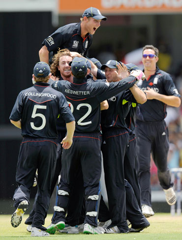 England players celebrate after a fall of a wicket
