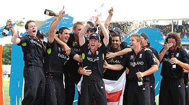 The English cricket team celebrates after winning the World T20 championship on Sunday