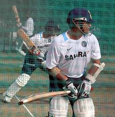 Sachin Tendulkar and Rahul Dravid bat during a practice session in Hyderabad