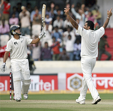 Zaheer Khan (right) celebrates after dismissing New Zealand's Ross Taylor