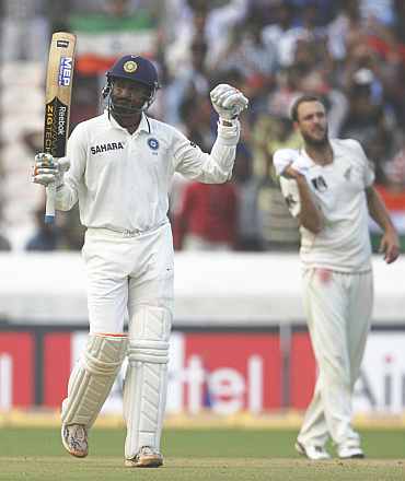 Harbhajan Singh celebrates after making a half-century