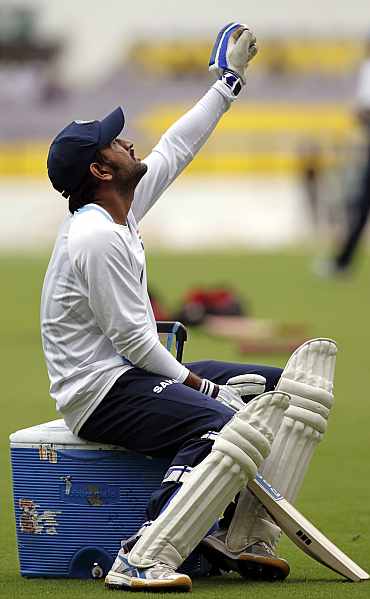 MS Dhoni looks up during a practice session in Nagpur