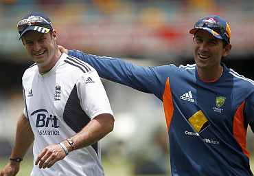 England's captain Andrew Strauss shares a smile with Justin Langer ahead of the first Ashes Test in Brisbane