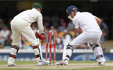 Australia's Brad Haddin tries to stump England's Alastair Cook during the first Ashes Test in Brisbane