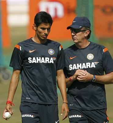 Sudeep Tyagi with Eric Simons, the Indian cricket team's bowling consultant