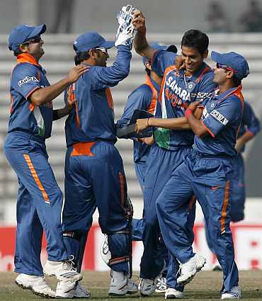 Sudeep Tyagi celebrates during an ODI