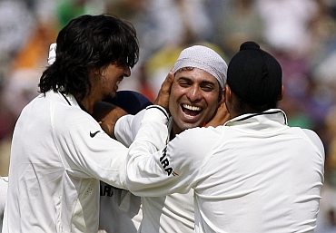 VVS Laxman, Harbhajan Singh and Ishant Sharma celebrate after winning the first Test