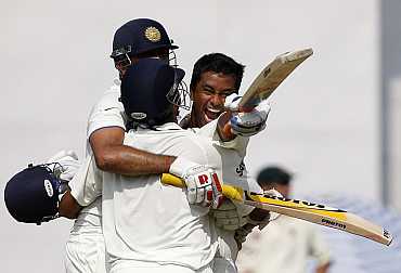 Pragyan Ojha reacts after winning the Mohali Test