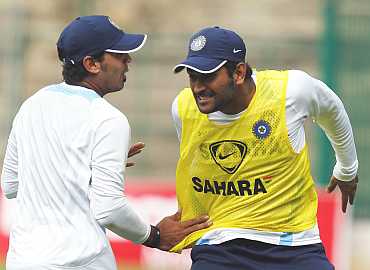 MS Dhoni and Murali Vijay during a practice session