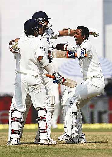 VVS Laxman celebrates after winning the Mohali Test