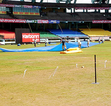 Groundsmen at work ahead of the Kochi one-dayer