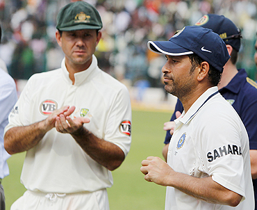 Ricky Ponting applauds as Sachin Tendulkar receives the Man-of-the-match award after the recently concluded Test series