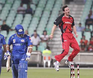 South Australian Redbacks' Aaron O'Brien reacts after dismissing Mumbai Indians' Sachin Tendulkar