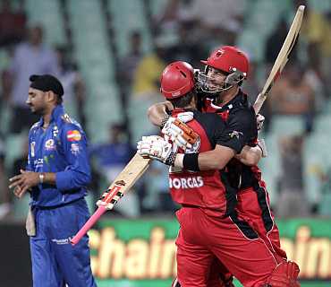 South Australian Redbacks' Borgas and Cooper celebrate after winning against Mumbai Indians in Durban