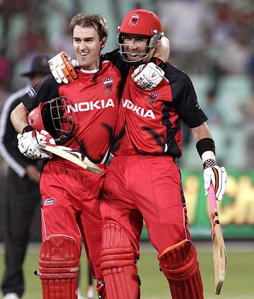 South Australian Redbacks' Cameron Borgas (left) and Tom Cooper celebrate winning their match against the Mumbai Indians