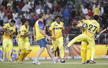 Chennai Super Kings players celebrate their win over the Warriors during their final Twenty20 cricket match in Johannesburg