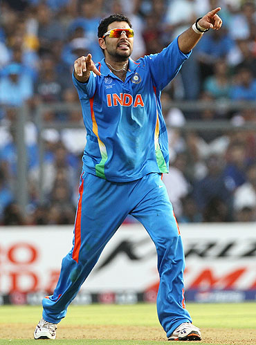 Yuvraj Singh appeals for an LBW against Thilan Samaraweera, who was declared out after review