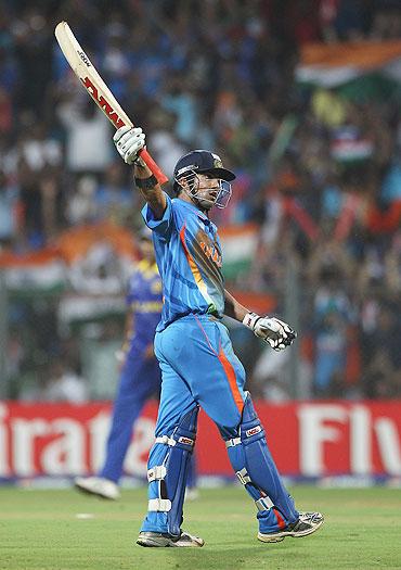 Gautam Gambhir of India celebrates reaching his fifty