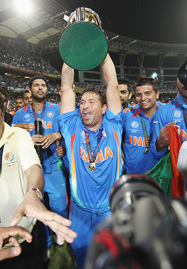 Sachin Tendulkar is chaired on a lap of honor after India's victory over Sri Lanka
