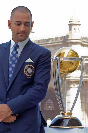 Indian captain MS Dhoni with the World Cup trophy